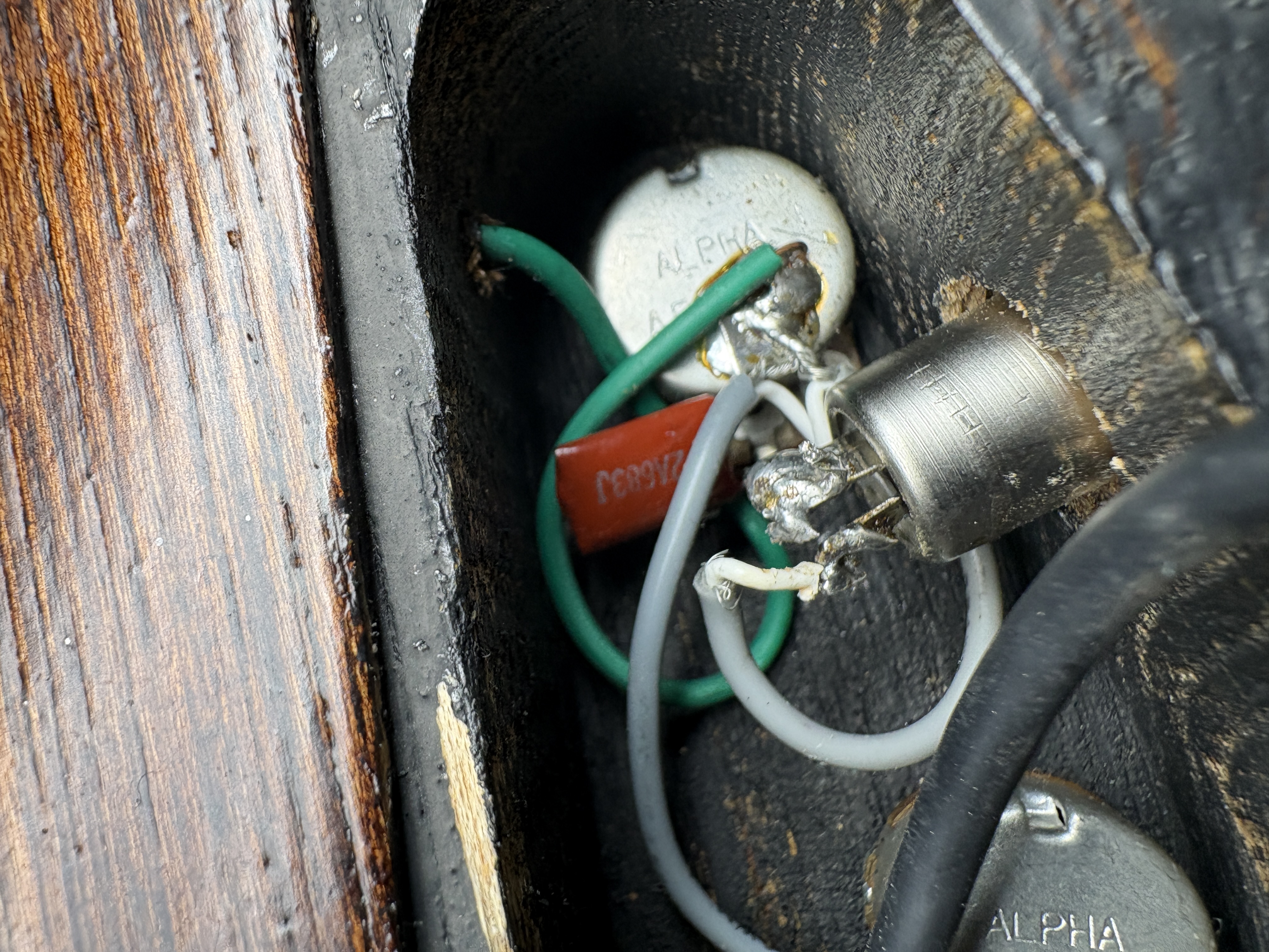 Solder repair on electric guitar electronics